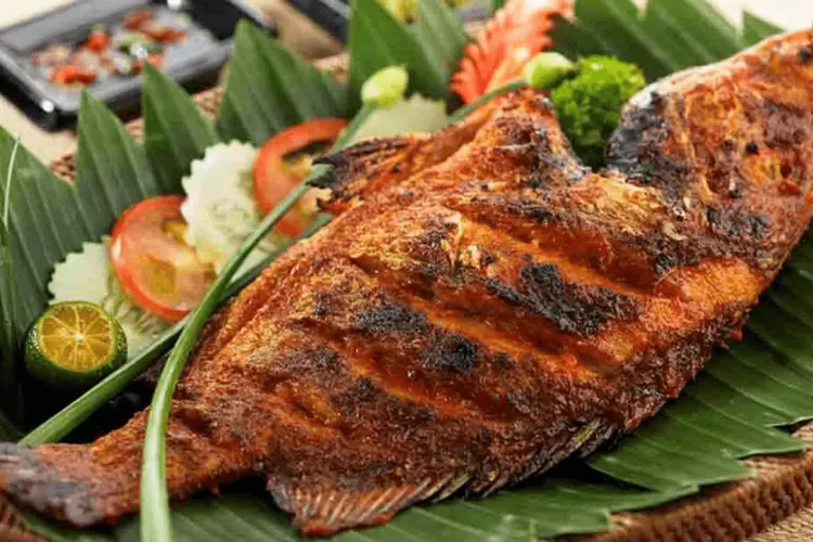 Ikan Bakar Batu Khas Papua: Lezatnya Hidangan Tradisional dari Tanah Cendrawasih